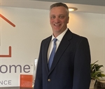 Headshot of John Tennett, Jr.