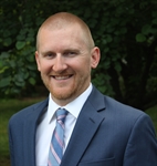 Headshot of Adam Carpenter