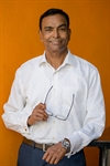 Headshot of George Raju
