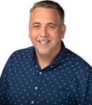 Headshot of Travis Ploman