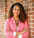 Headshot of Athena Pearl Riley